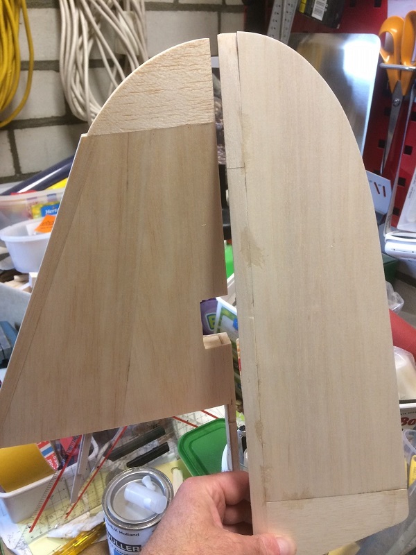 156 hold new rudder next to vert stab.jpg